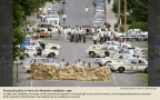 Provincial police in front of a Mohawk roadblock, 1990